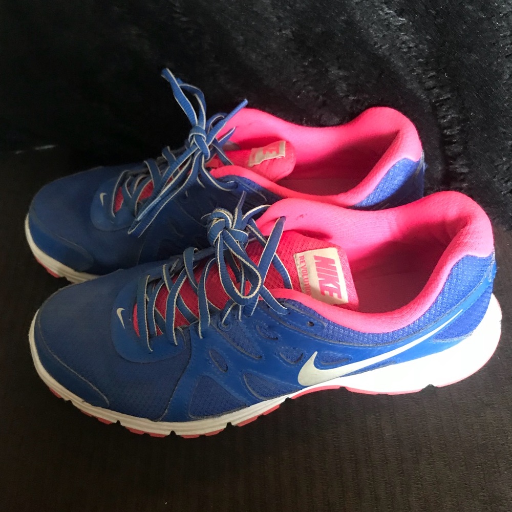 Pink and Blue Nike running shoes